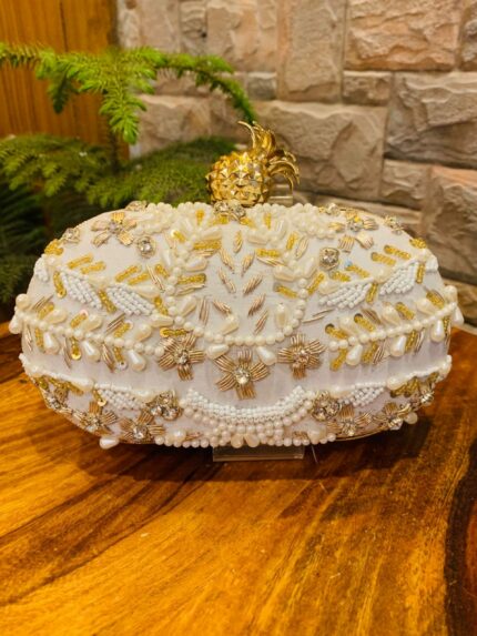 Embroidered clutch