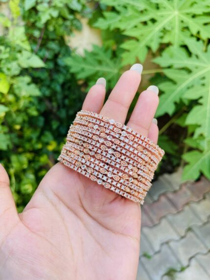 Ad rose gold bangles (set of 4)