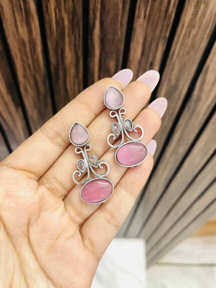 Pink debo brass earrings