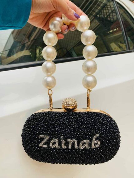 Pearl black handle clutch