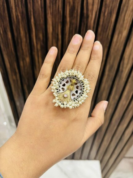 Dual tone peacock brass ring