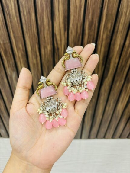 Two peacock brass earrings Pink
