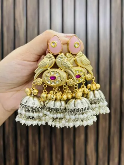 Two jhumki brass earrings pink