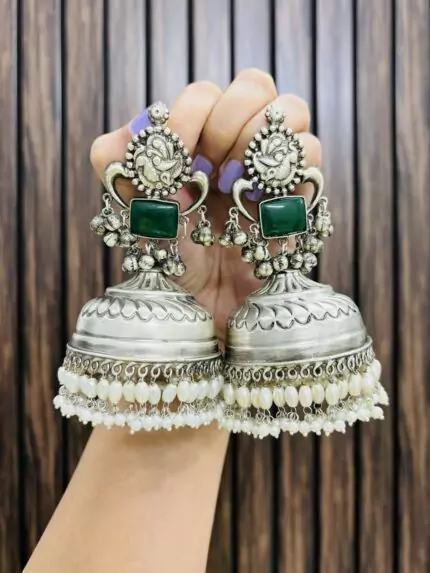 Geetika brass jhumka green